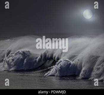 Big stormy detaled wave in a misty full moon night Stock Photo