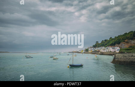 Aberdovey Harbour with numerous boats and yachts on the north side of the estuary of the River Dyfi in Gwynedd on the West Coast of Wales Stock Photo