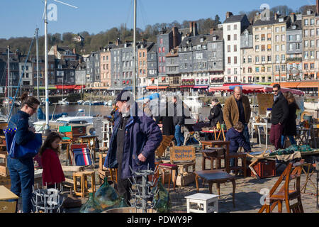 An Antiques Market or Brocante  on the quayside by the old harbour, Vieux Bassin, at Honfleur, Normandy, France Stock Photo