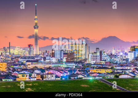 Tokyo, Japan cityscape with Mt. Fuji in the distance at dusk. Stock Photo