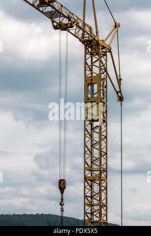 High crane on the road construction site Stock Photo