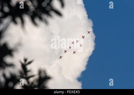 Portsmouth, UK, 10th August 2018, The Red Arrows performing their Cowes Week display over the Solent, Nikki Courtnage Credit: Nikki Court/Alamy Live News Stock Photo