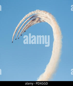 Red Arrows Aerobatic Display, Cowes, Isle of Wight, UK, 10 August 2018, 19:30 Hours. The Royal Air Force Aerobatic Display Team performs for Cowes Week, Credit: Sam Kurtul / Alamy Live News Stock Photo