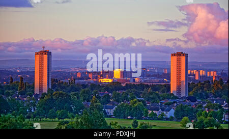 Glasgow, Scotland, UK 11th August. UK Weather: Red dawn on the towers of Southern Glasgow as the high rises in Scotstoun and the Queen Elizabeth University Hospital turns blood red in the South west of the city to  reflect the shepherd’s warning for the day ahead for the European championships in the city. Gerard Ferry/Alamy news Stock Photo