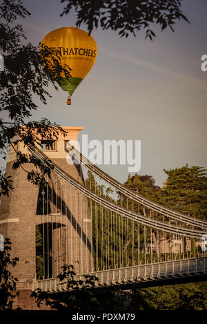 Bristol, UK. 11th August, 2018. Views of Clifton Suspension bridge at the 40th anniversary of the international balloon fiesta. Balloons fill the skies around Clifton Suspension Bridge and surrounding areas. Andrew Coleman/Alamy Live News Stock Photo