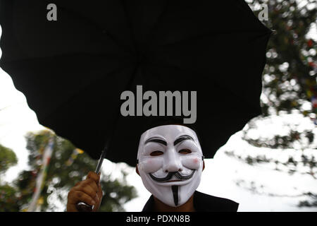 Kathmandu, Nepal. 11th Aug, 2018. An activist wearing a mask takes part in an awareness campaign in opposition to violence against animals at Swayambhunath Stupa premise in Kathmandu, Nepal on Saturday, August 11, 2018. Credit: Skanda Gautam/ZUMA Wire/Alamy Live News Stock Photo