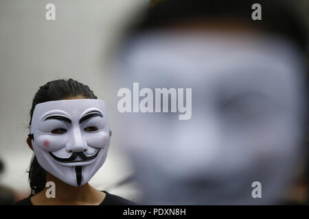 Kathmandu, Nepal. 11th Aug, 2018. An activist wearing a mask takes part in an awareness campaign in opposition to violence against animals at Swayambhunath Stupa premise in Kathmandu, Nepal on Saturday, August 11, 2018. Credit: Skanda Gautam/ZUMA Wire/Alamy Live News Stock Photo