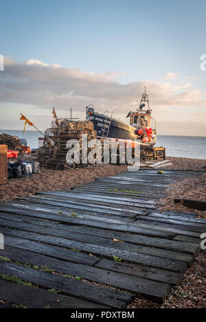 A fishing boat and lobster nets on Deal beach, Kent Stock Photo