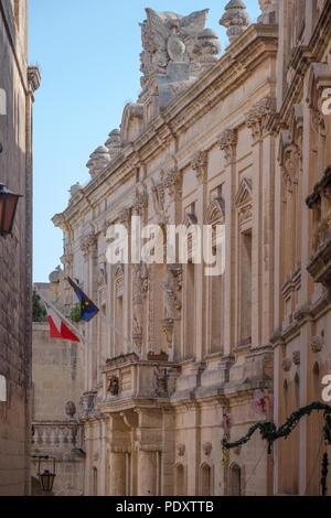 Squeezed along narrow, winding streets in Malta's old, walled capital of Mdina are sumptuous buildings and history going back to 1000BC Stock Photo