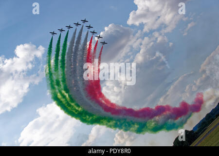 The Italian Military Aerobatic Display Team Frecce Tricolori paint the flag of Italy over the airbase at the RIAT Stock Photo