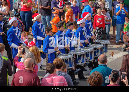 Percussion drum section of high school marching band in annual Georgetown, Texas Christmas parade. Stock Photo