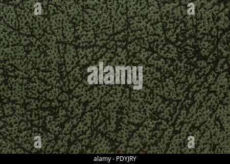 Uncommon textile background in saturated deep green hue. Stock Photo