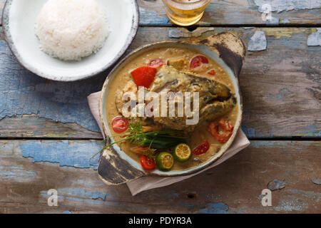 Curry fish head, Traditional singaporean cuisine Stock Photo