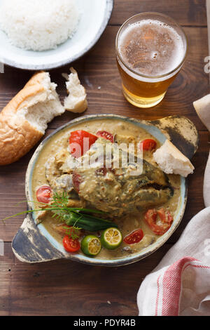 Curry fish head, Traditional singaporean cuisine Stock Photo