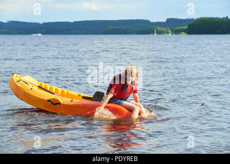 Young school children canoeing on Ullswater in the English ...