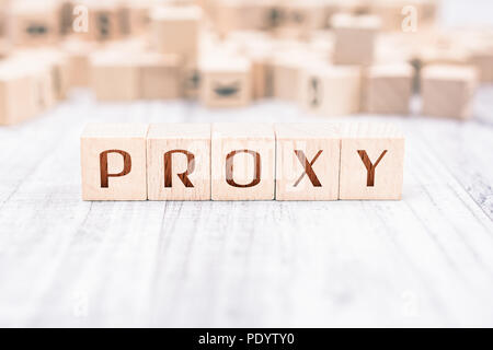 The Word Proxy Formed By Wooden Blocks On A White Table Stock Photo