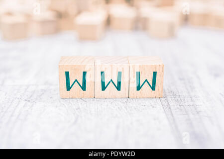 The Word WWW Formed By Wooden Blocks On A White Table Stock Photo