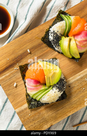 Homemade Trendy Japanese Sushi Donuts with Salmon Avocado and Veggies ...