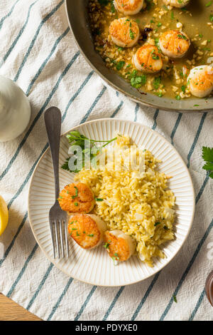 Panned Seared Scallops in Broth Ready to Eat Stock Photo