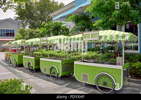 Food carts. Unmanned line of mobile food carts in a Thailand shopping ...