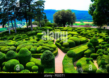 Gardens and topiary of the Chateau de Marqueyssac near the village od Domme in the Dordogne region of France Stock Photo