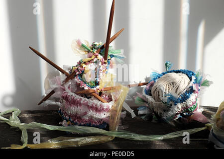 Cut nylon bag into yarn and knit to basket, good idea to recycle nylon bag to reduce environmental pollution Stock Photo