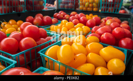 Tomatoes Arranged for Sale in the Early Morning Stock Photo