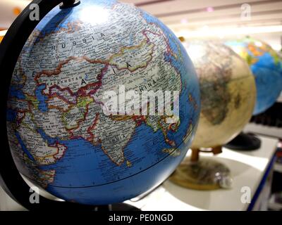Photo of globe maps on display at a store Stock Photo