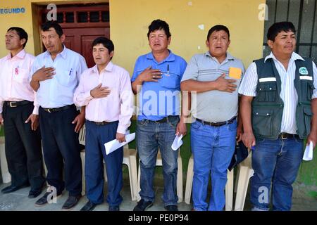 Singing the national anthem - Fiestas Virgen del Carmen in El CARMEN DE LA FRONTERA - Ecuador border -. Department  of Piura .PERU        Stock Photo