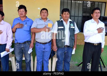 Singing the national anthem - Fiestas Virgen del Carmen in El CARMEN DE LA FRONTERA - Ecuador border -. Department  of Piura .PERU        Stock Photo