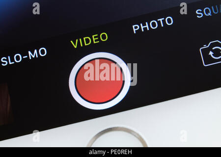 Shutter button on iPhone video camera app screen Stock Photo
