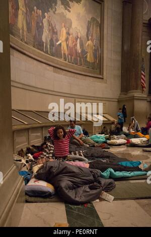 During a space-themed sleepover at the National Archives in Washington, DC, on February 24-25, 2018, intrepid explorers learn about the mysteries of space travel with former space shuttle astronaut Charles Bolden; dive into our nation’s treasured records, including historic NASA files; explore the National Archives Museum with a scavenger hunt; sleep in the Rotunda next to the Charters of Freedom; and wake to a pancake breakfast served by the Archivist of the United States. Stock Photo