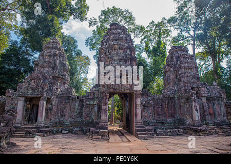 Ancient gate of Preah Khan the stone temple surround with forest in Angkor the world heritage , Siem Reap , Cambodia Stock Photo