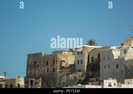 Historic old town at Naxos island Greece.  Built by the Venetians, a view of the Kastro, the defensive quarter.  Old buildings look out to sea. Stock Photo