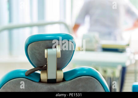 Dentist's chair in the office back view Stock Photo