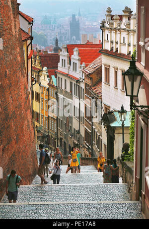 Prague, Czech Republic Jun 9, 2018: A small charming street in lesser town district (Mala Strana) that leads to Prague castle (Prazsky Hrad) Stock Photo