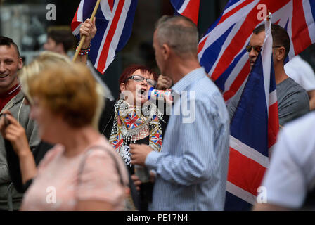 A counter protest by the loyalist group Northern Ireland Against Terrorism at an anti-internment march in Belfast city centre. Stock Photo