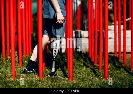 Disabled young man with foot prosthesis Stock Photo