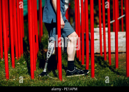 Disabled young man with foot prosthesis Stock Photo