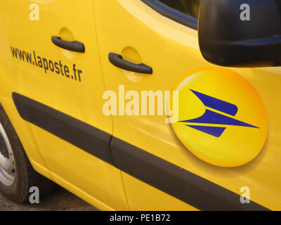 The postal service depot with delivery vans in Cessenon-sur-Orb, France Stock Photo