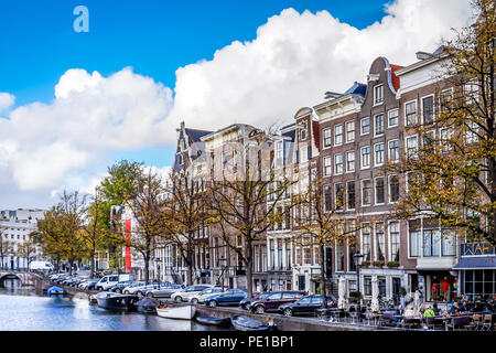 The Keizersgracht (Emperor's Canal) with its cafe terraces and large historic houses in the historic center of Amsterdam, the Netherlands Stock Photo