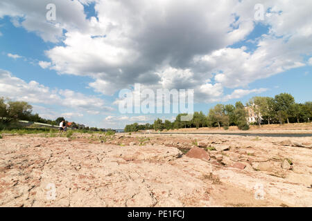 Magdeburg, Germany - August 10, 2018: View of the dry riverbed of the Elbe in Magdeburg after it had not rained from April to August 2018. Drought. Cl Stock Photo