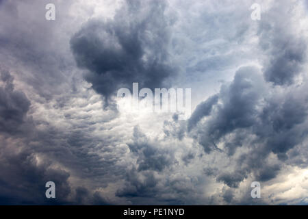 Background of dark clouds before a storm. Stock Photo