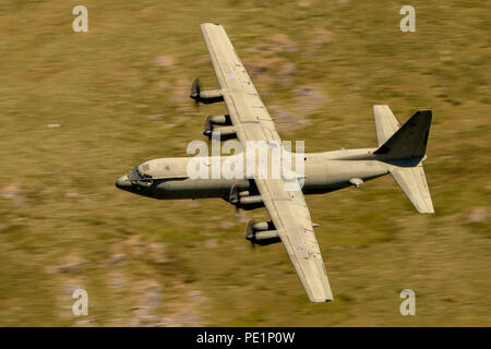 RAF Hecules on a low level training mission in the Mach Loop (LFA7) Stock Photo