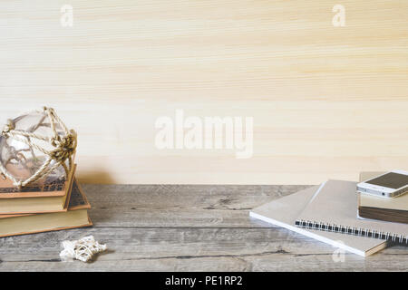 School notebooks, pencils and other items on wooden background Stock Photo