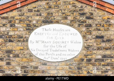 18th century plaque on Squire’s almshouses, Church End, Walthamstow Village, Borough of Waltham Forest, Greater London, England, United Kingdom Stock Photo