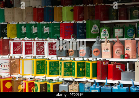 Restored old and vintage oil cans on display at the annual Ellingham and Ringwood Agricultural Society Show, Hampshire, England Stock Photo