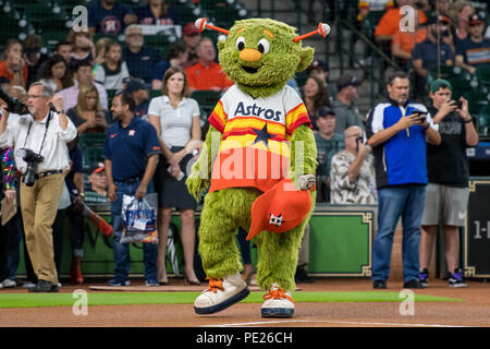 Houston Astros mascot Orbit entertains the crowd prior to an MLB baseball  game against the Seattle Mariners at Minute Maid Park on Monday April 22,  2013 in Houston, Texas. Seattle won 7-1. (