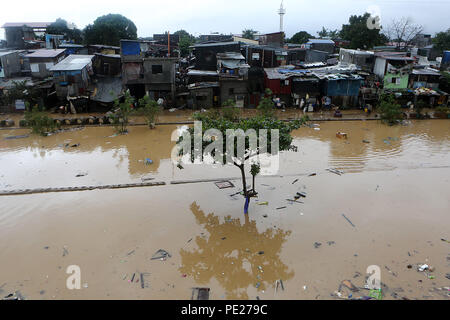 Marikina City, Philippines. 12th Aug, 2018. Shanties are submerged in flood brought by tropical storm Yagi in Marikina City, the Philippines, Aug. 12, 2018. Credit: Rouelle Umali/Xinhua/Alamy Live News Stock Photo