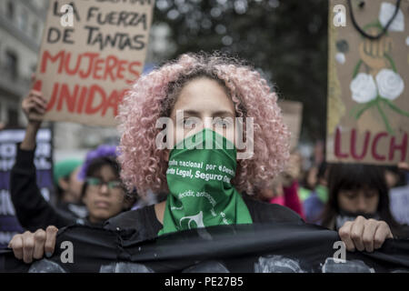 Lima, Peru. 11th Aug, 2018. A demonstrator seen during a Ni Una Menos (Not One Less) rally in protest of gender based violence in Lima. Ni Una Menos (Not One Less) demands that women should be protected from violent deaths at the hands of men in Peru. Credit: Guillermo Gutierrez/SOPA Images/ZUMA Wire/Alamy Live News Stock Photo